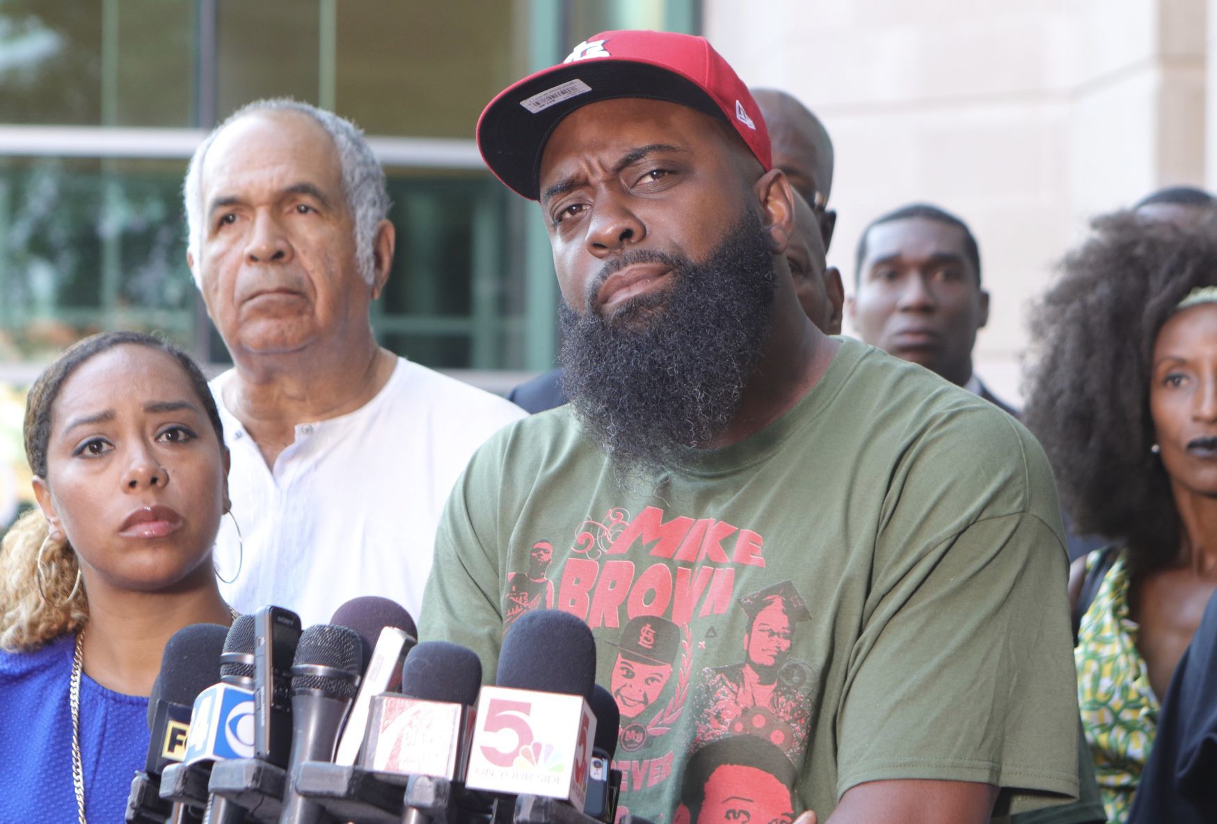 Michael Brown Sr. speaks to the press